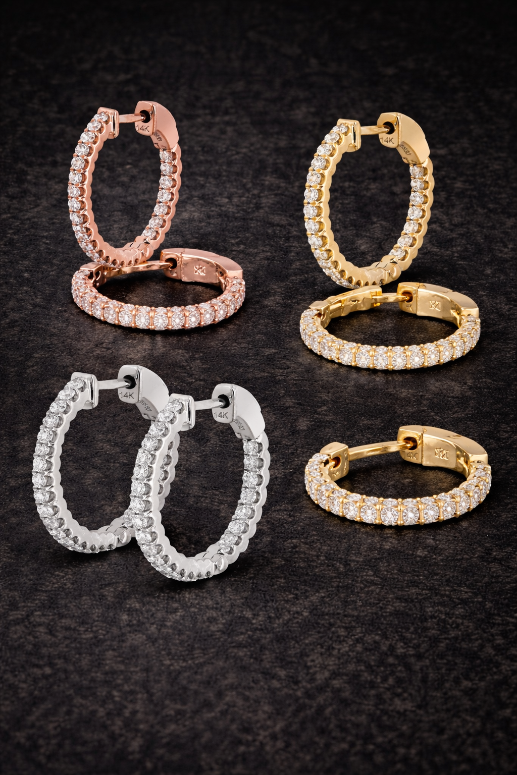 Four pairs of hoop earrings in rose gold, gold, silver, and gold on a dark textured background.